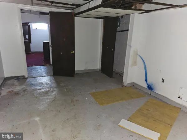 a view of room with racks on the wall