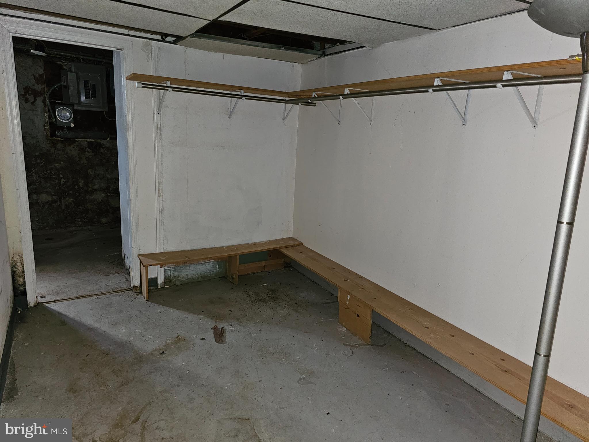 3239 Dudley Avenue Baltimore, MD 21213 - Photo 31 of 31 a view of room with racks on the wall