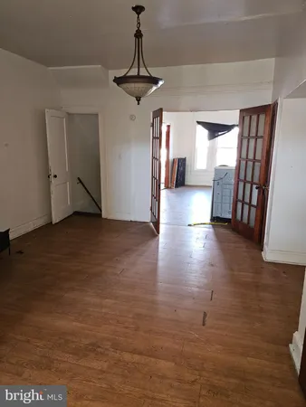 a view of gallery with wooden floor