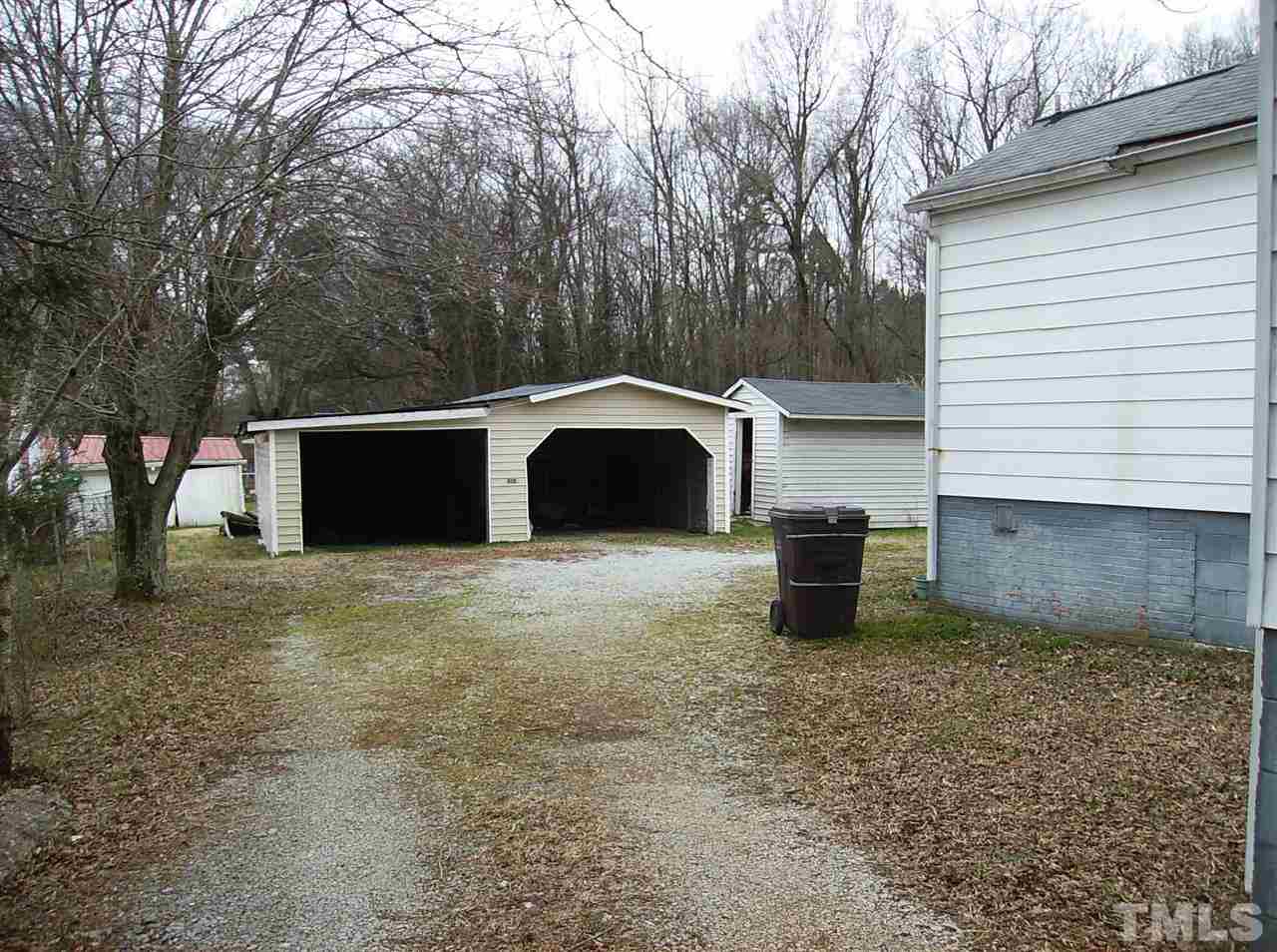 1272 Ridge Road Roxboro, NC 27573 - Photo 2 of 8 a front view of a house with parking space