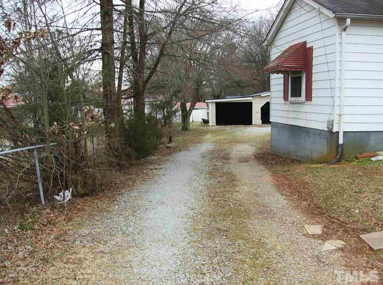 1272 Ridge Road Roxboro, NC 27573 - Photo 4 of 8 a front view of a house with a yard