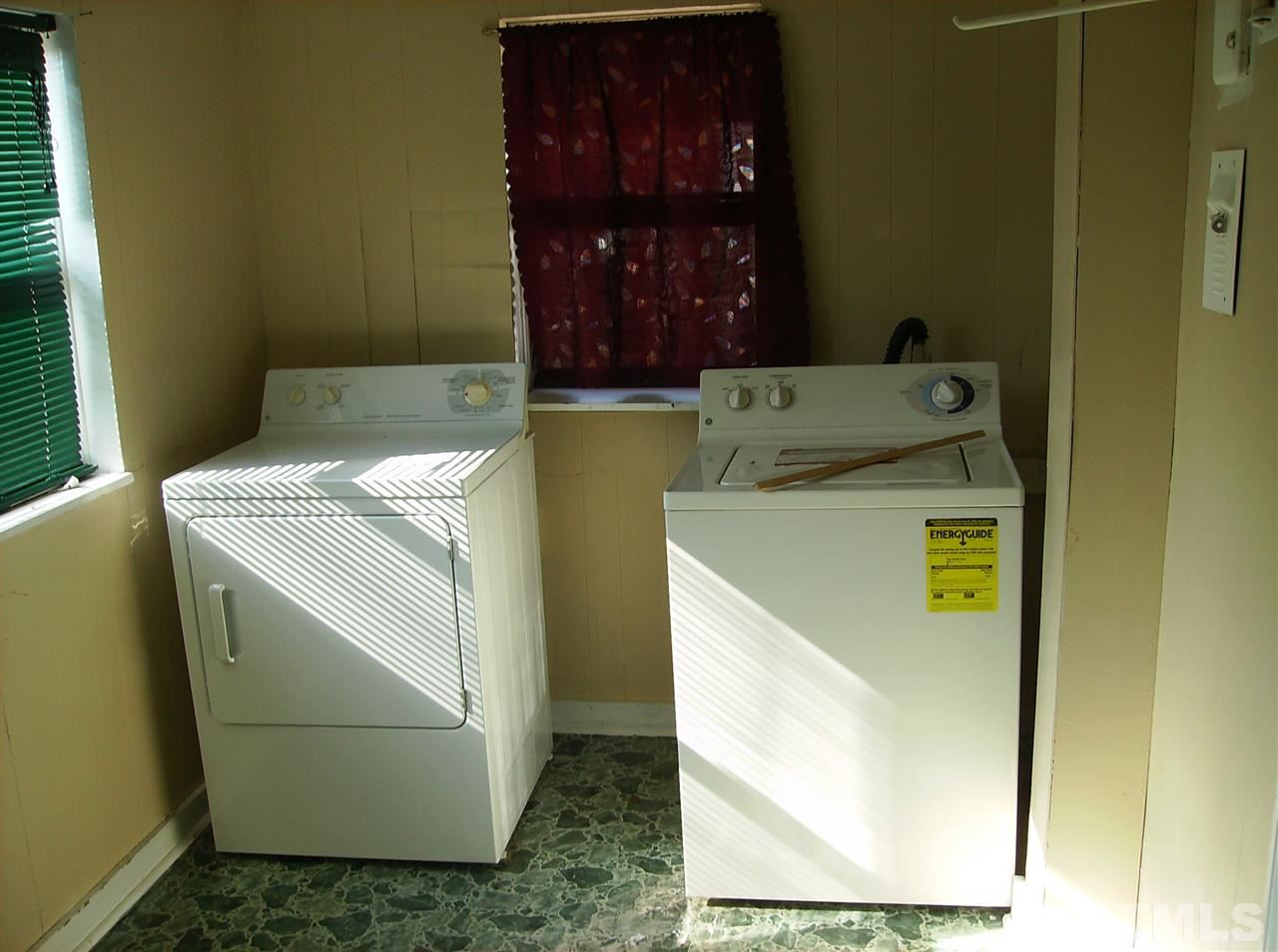 1272 Ridge Road Roxboro, NC 27573 - Photo 8 of 8 a utility room with dryer and washer