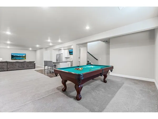 a room with furniture and a wooden floor