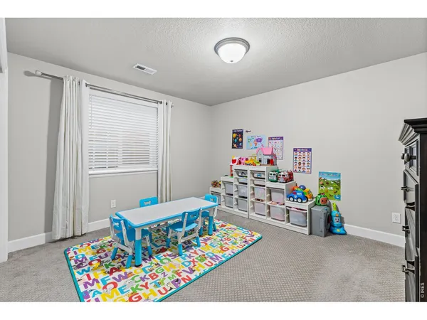 a utility room with closet dryer and washer