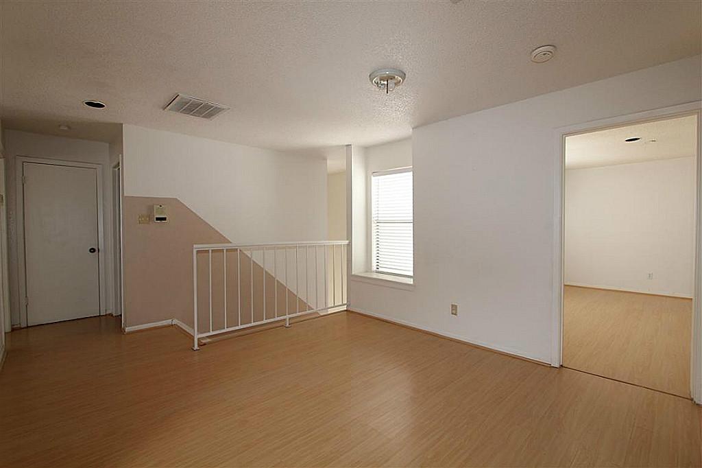2277 South Kirkwood Road, Unit 708 Houston, TX 77077 - Photo 3 of 13 a view of an empty room with a window