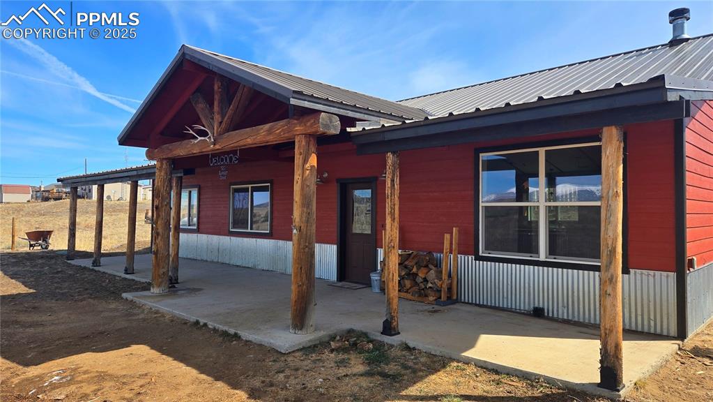 120 Sunset Drive Westcliffe, CO 81252 - Photo 2 of 20 a view of a house with wooden floor and fence
