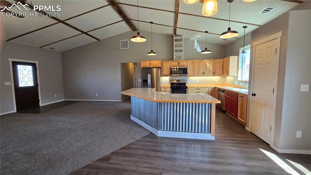 120 Sunset Drive Westcliffe, CO 81252 - Photo 10 of 20 a living room with a couch and a table with wooden floor