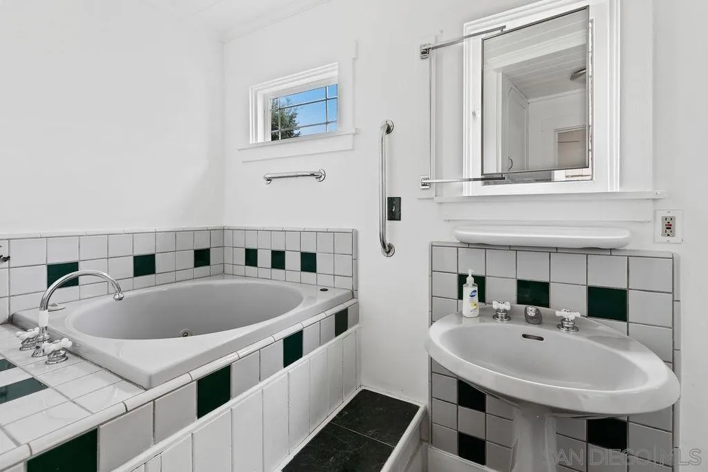 4531 Date Avenue La Mesa, CA 91941 - Photo 25 of 34 a bathroom with a sink and a bathtub