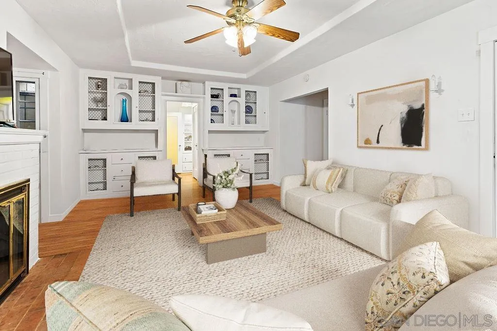 4531 Date Avenue La Mesa, CA 91941 - Photo 9 of 34 a living room with furniture and a fireplace