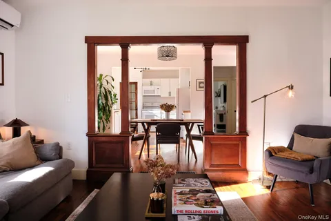 a living room with furniture and a window
