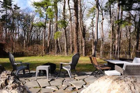 a view of a park with furniture