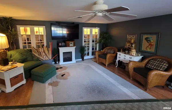 a bedroom with furniture and window