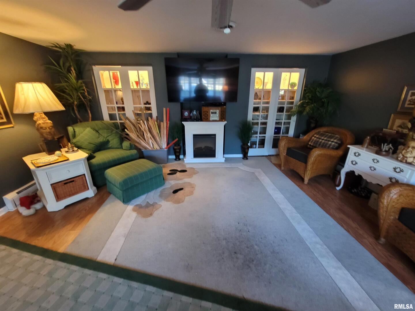 321 West Boone Street Salem, IL 62881 - Photo 35 of 46 a living room with furniture and a fireplace