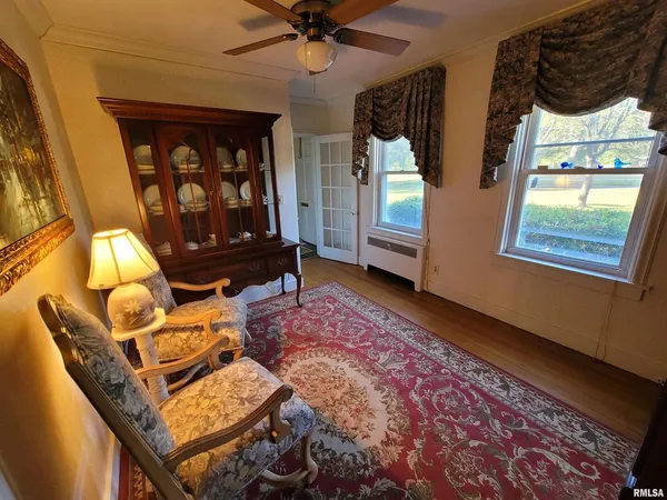 a living room with furniture and a window