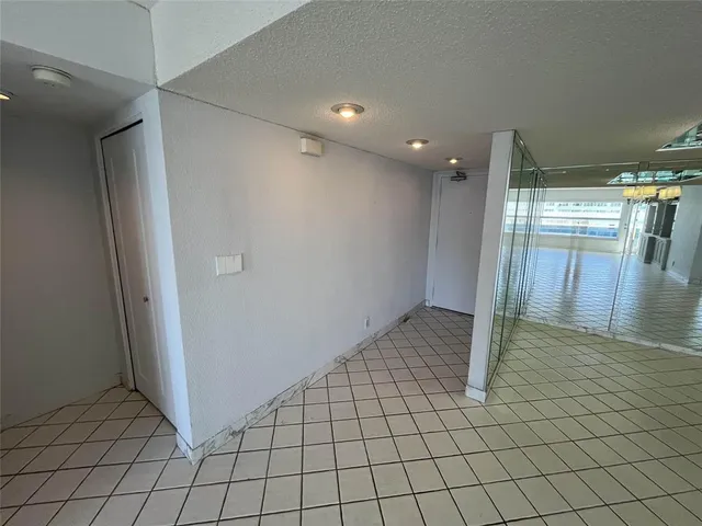 a kitchen with a stove a sink and a microwave