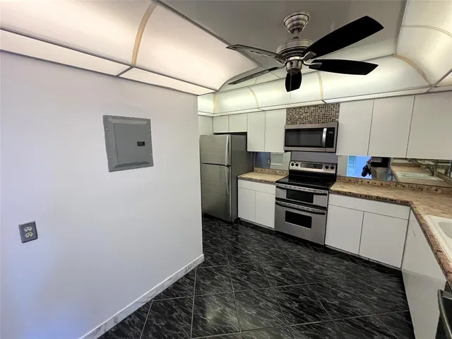 a bathroom with a sink and toilet