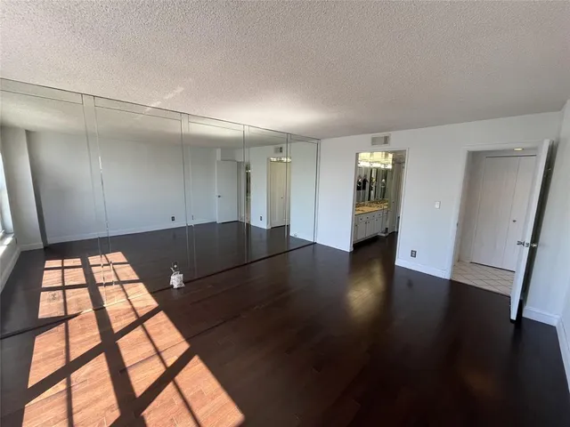 a view of a city with tall buildings