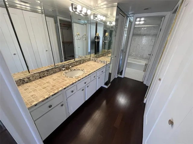 a bathroom with a bath tub and a shower