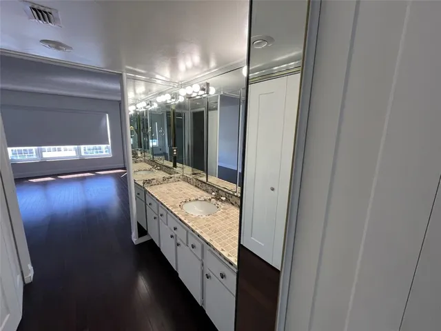 a bathroom with a sink a toilet and a bathtub