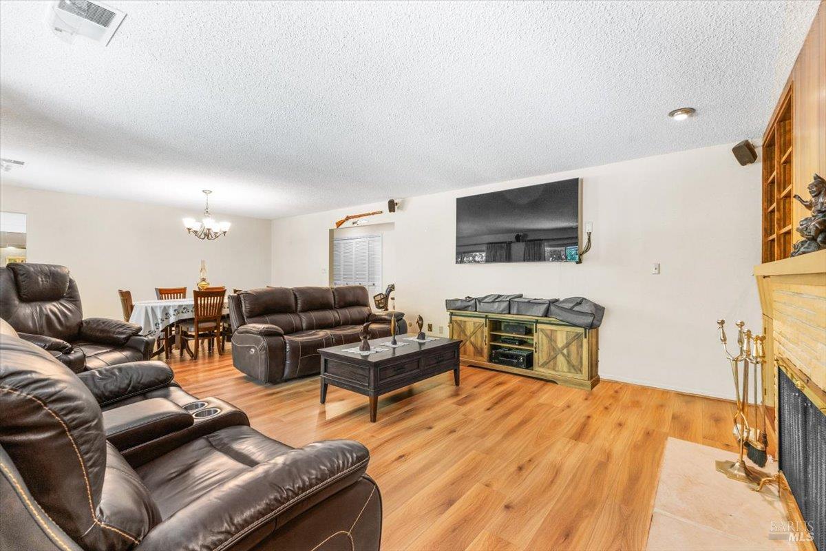 442 Las Casitas Court, Unit A Santa Rosa, CA 95403 - Photo 13 of 33 a living room with furniture and a flat screen tv