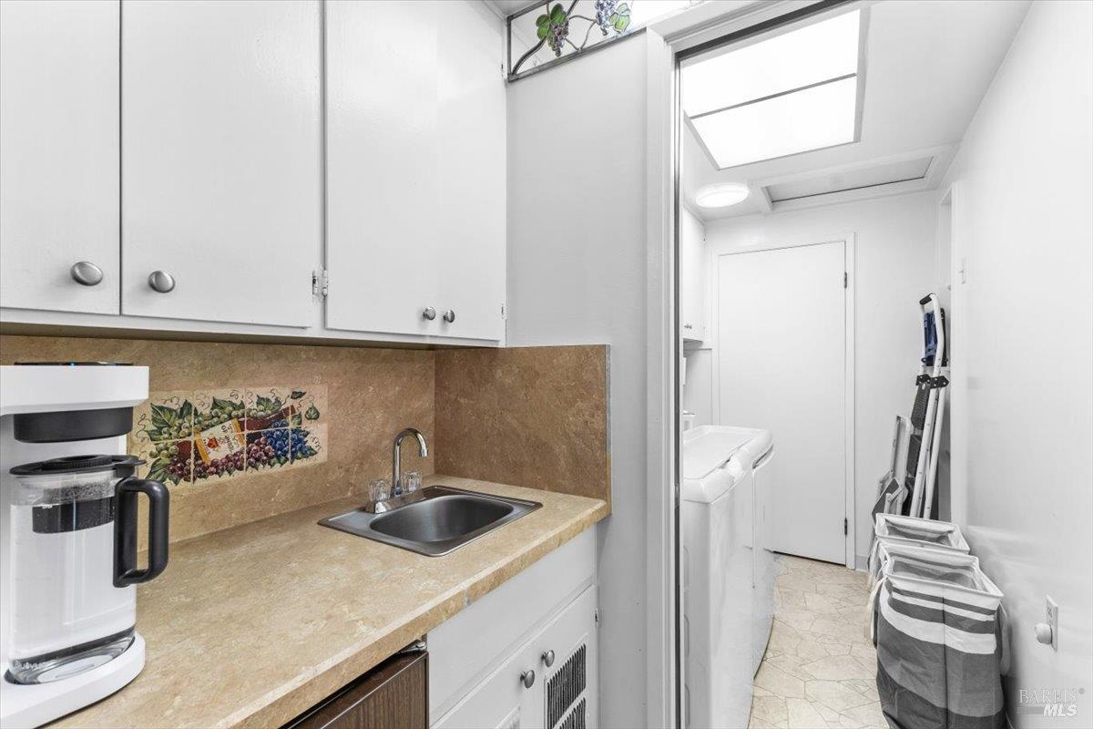 442 Las Casitas Court, Unit A Santa Rosa, CA 95403 - Photo 22 of 33 a kitchen with a sink and cabinets