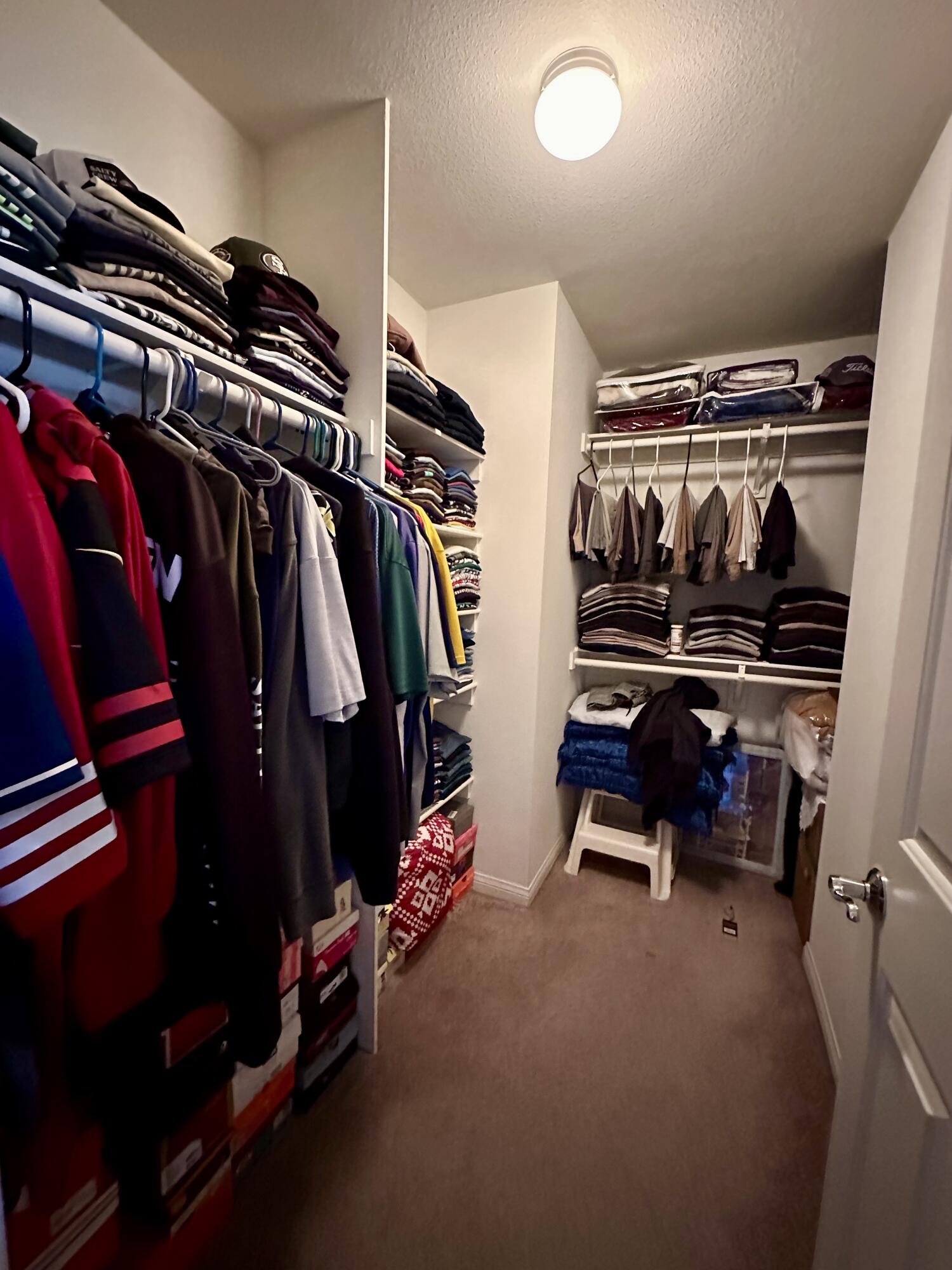 575 West Rice Street Blythe, CA 92225 - Photo 17 of 24 a view of walk in closet with clothes and shoes