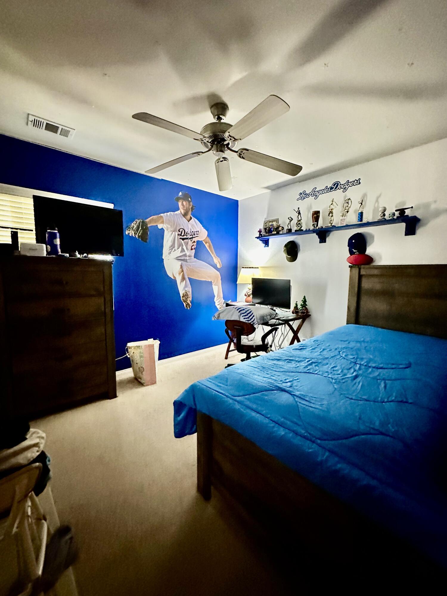 575 West Rice Street Blythe, CA 92225 - Photo 22 of 24 a bed room with a bed and a television