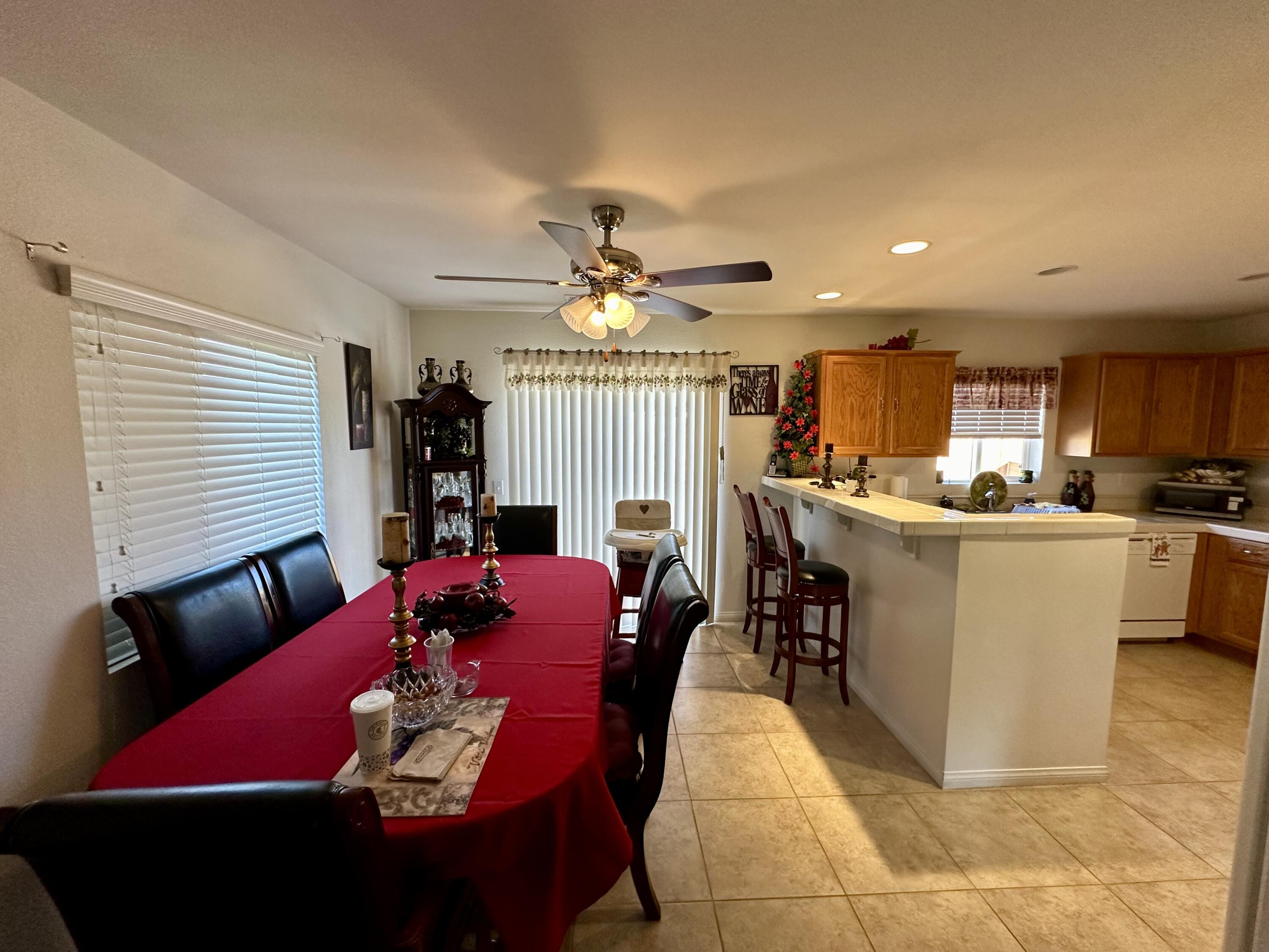575 West Rice Street Blythe, CA 92225 - Photo 9 of 24 a living room with furniture kitchen view and a chandelier
