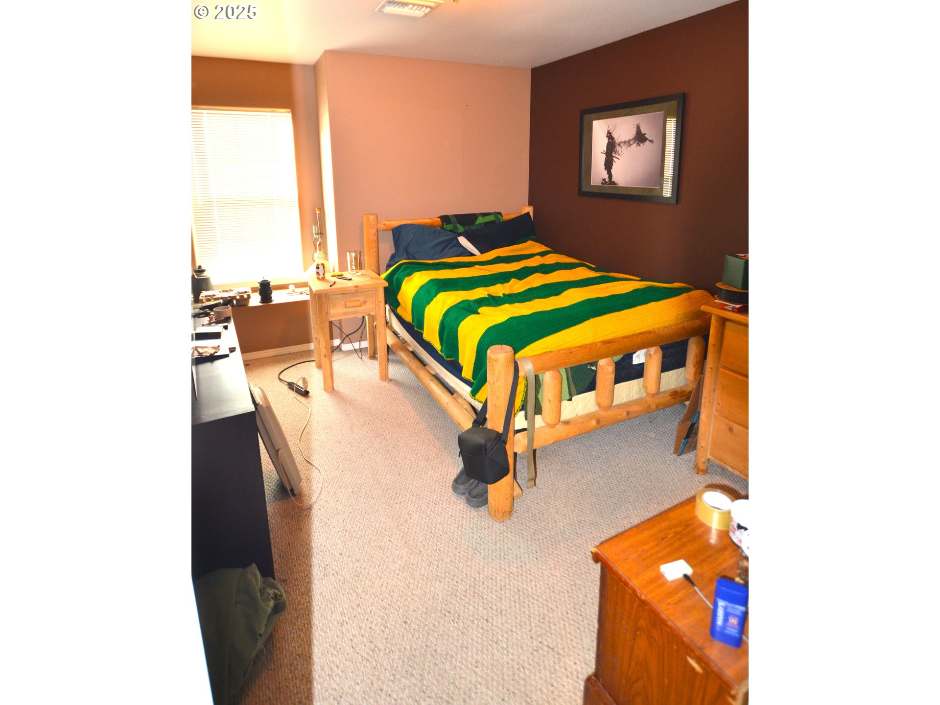 1616 Southwest 2nd Street Pendleton, OR 97801 - Photo 17 of 23 a bedroom with a bed and a night stand