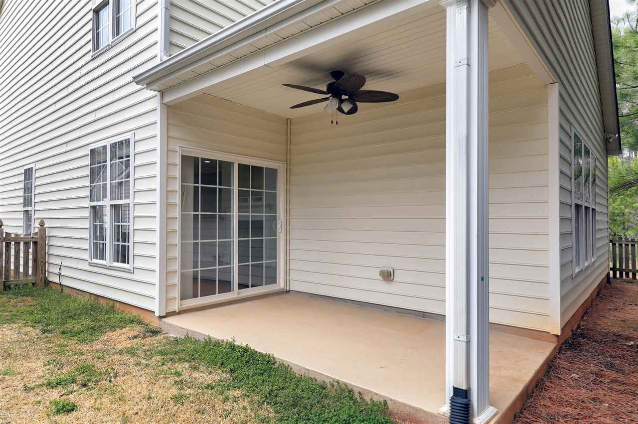 8424 Aztec Dawn Court Raleigh, NC 27613 - Photo 28 of 30 Covered Porch overlooking backyrd