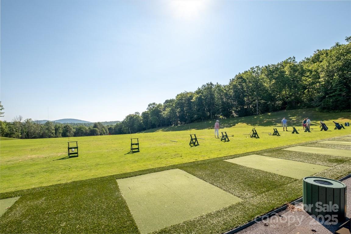 Lot 129 Inoli Circle, Unit 129/7 Brevard, NC 28712 - Photo 11 of 25 a view of a field with an ocean