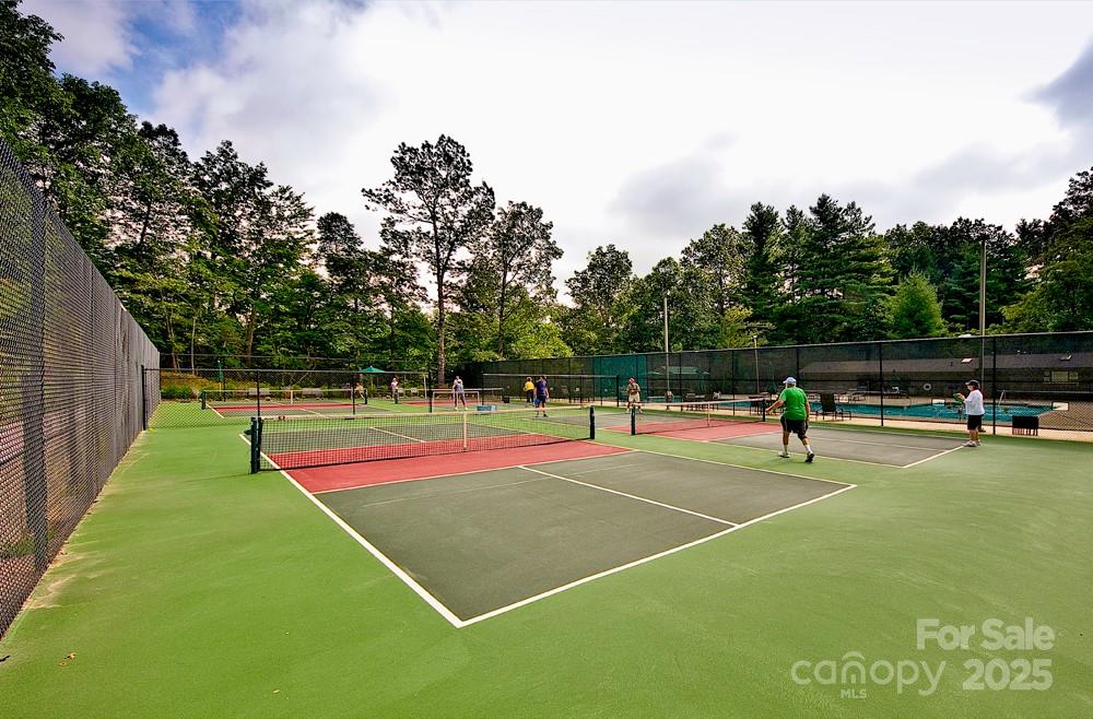 Lot 129 Inoli Circle, Unit 129/7 Brevard, NC 28712 - Photo 12 of 25 a view of tennis court with chairs