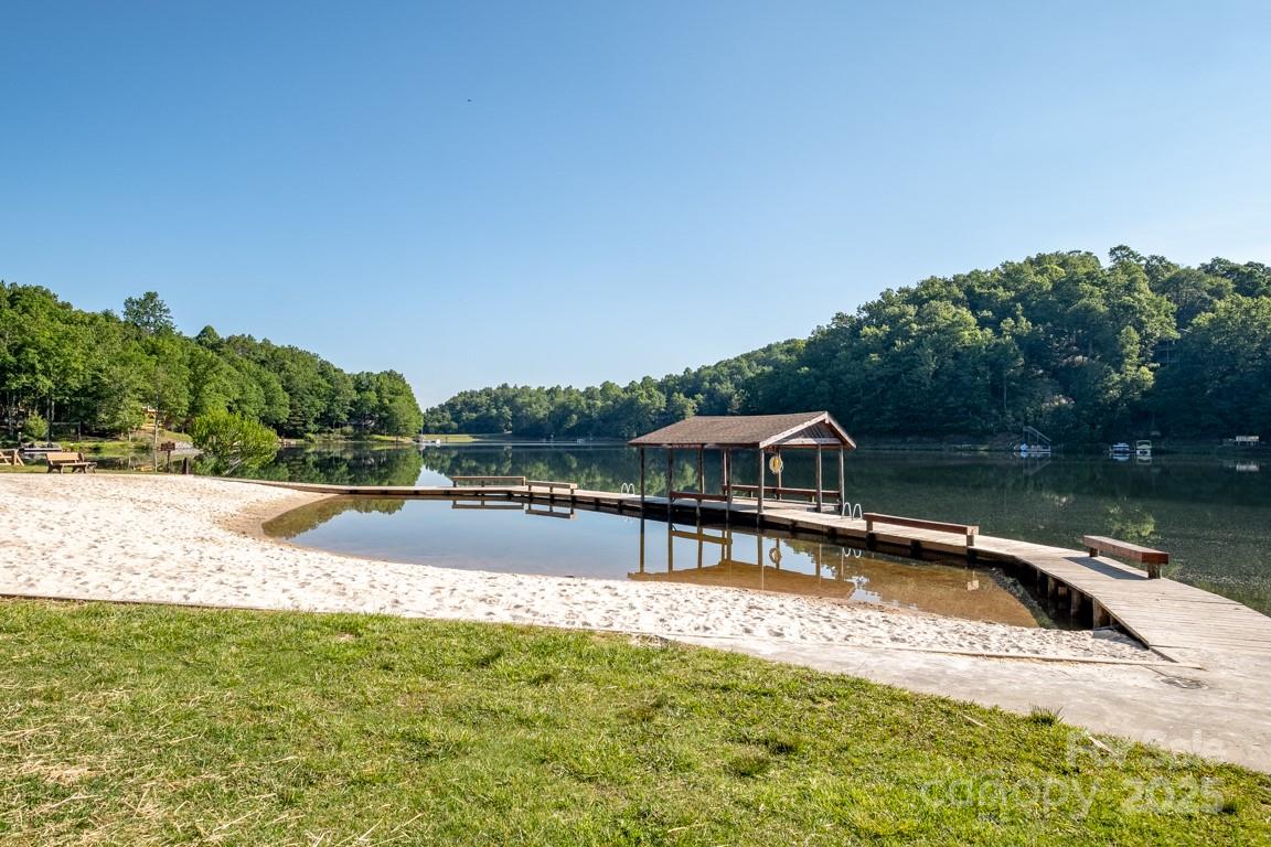 Lot 129 Inoli Circle, Unit 129/7 Brevard, NC 28712 - Photo 9 of 25 a view of a swimming pool with a patio