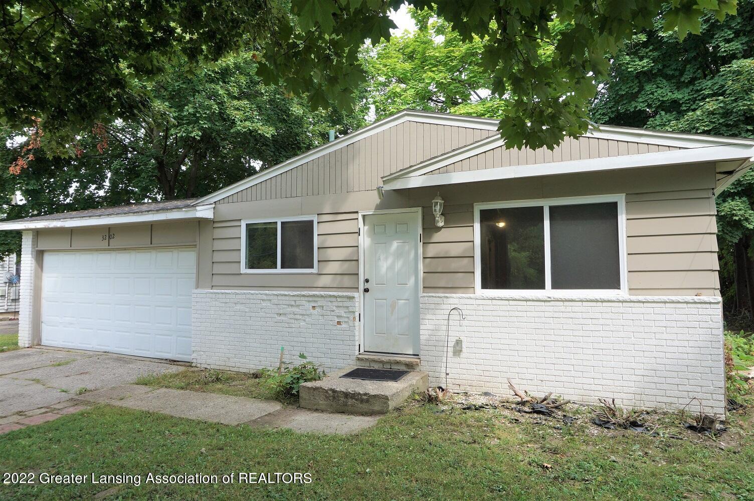 3202 West Jolly Road Lansing, MI 48911 - Photo 1 of 11 Jolly 1