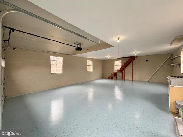 a view of a livingroom with a staircase