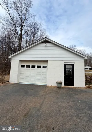 a front view of a house with a garage