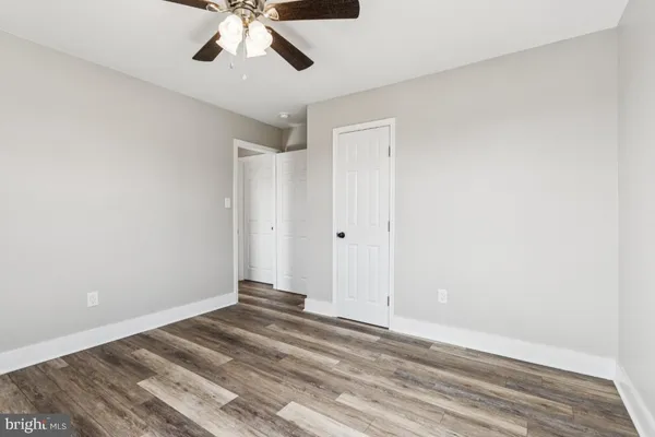 a view of a ceiling fan in a room