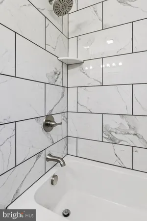 a bathroom with a bathtub