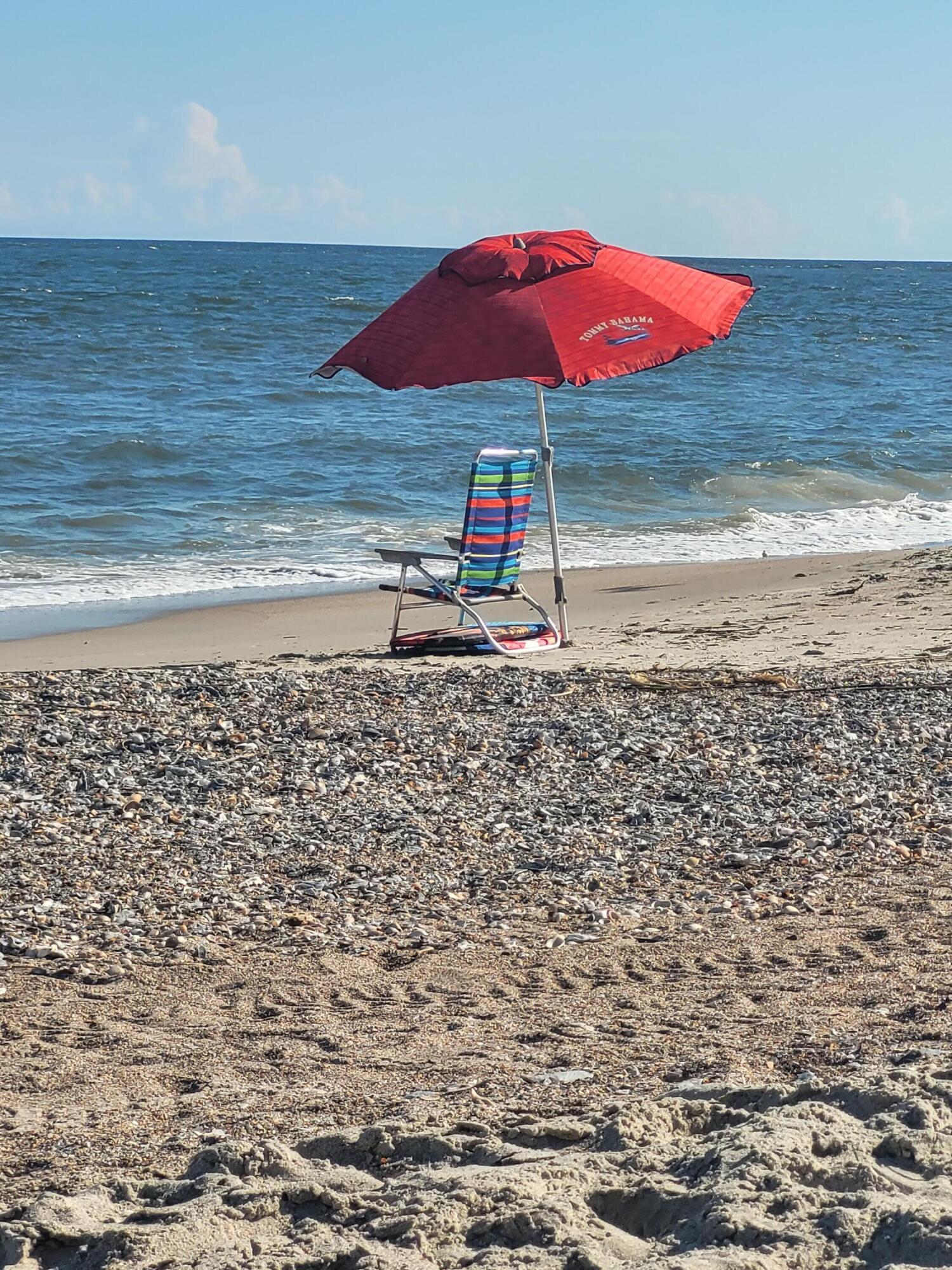 60 Rice Lane Edisto Beach, SC 29438 - Photo 41 of 44 Beach 2024 Red umbrella on Beach