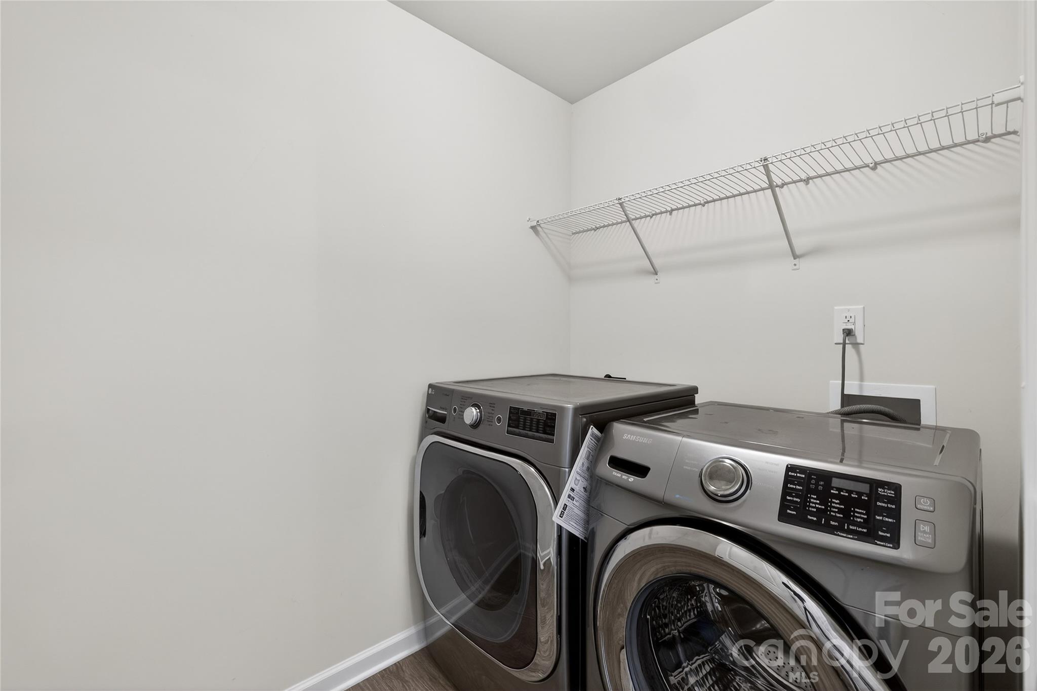 128 Pleasant Hill Street Lancaster, SC 29720 - Photo 14 of 26 a utility room with dryer and washer