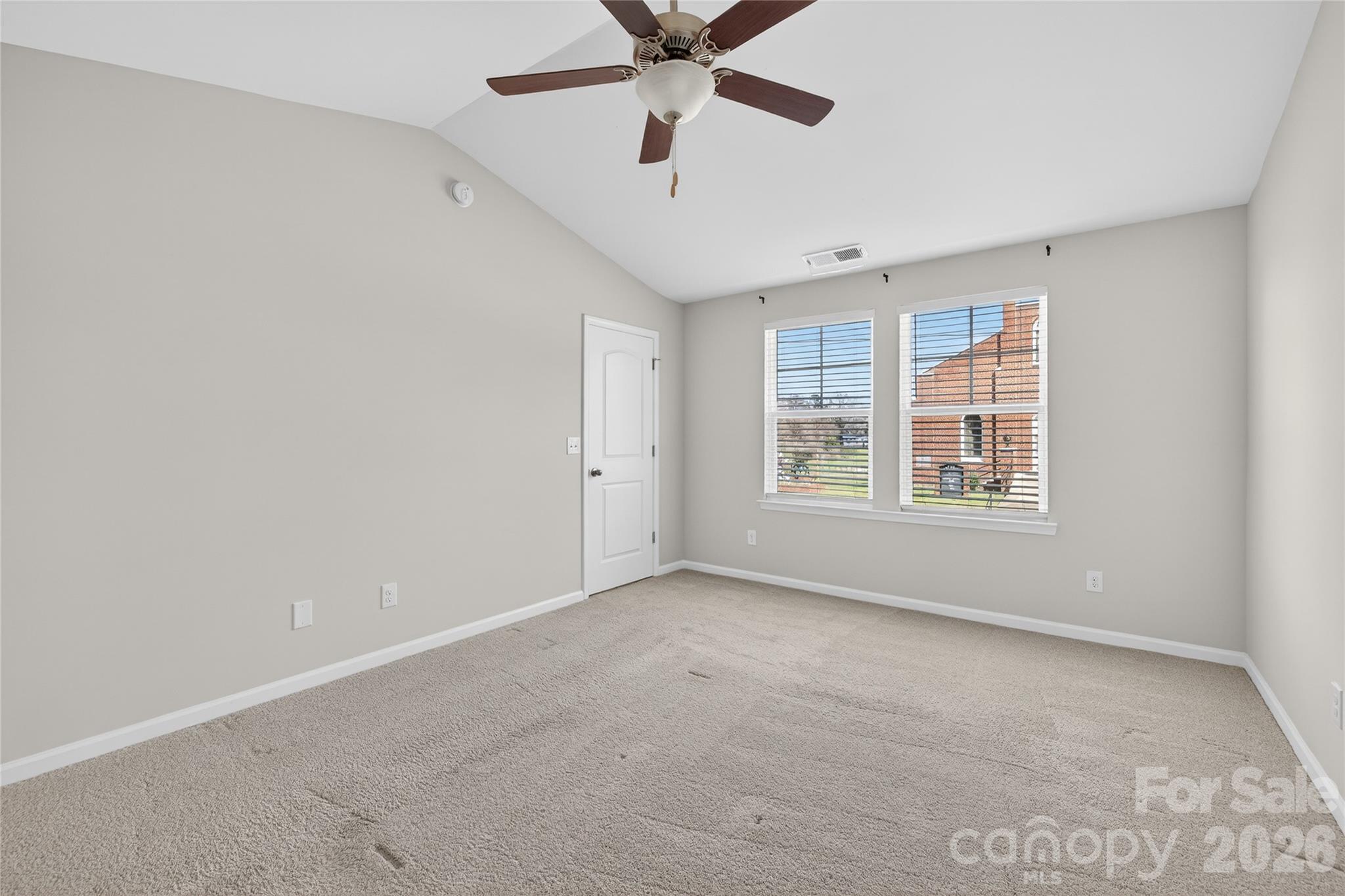 128 Pleasant Hill Street Lancaster, SC 29720 - Photo 16 of 26 a view of an empty room with a window