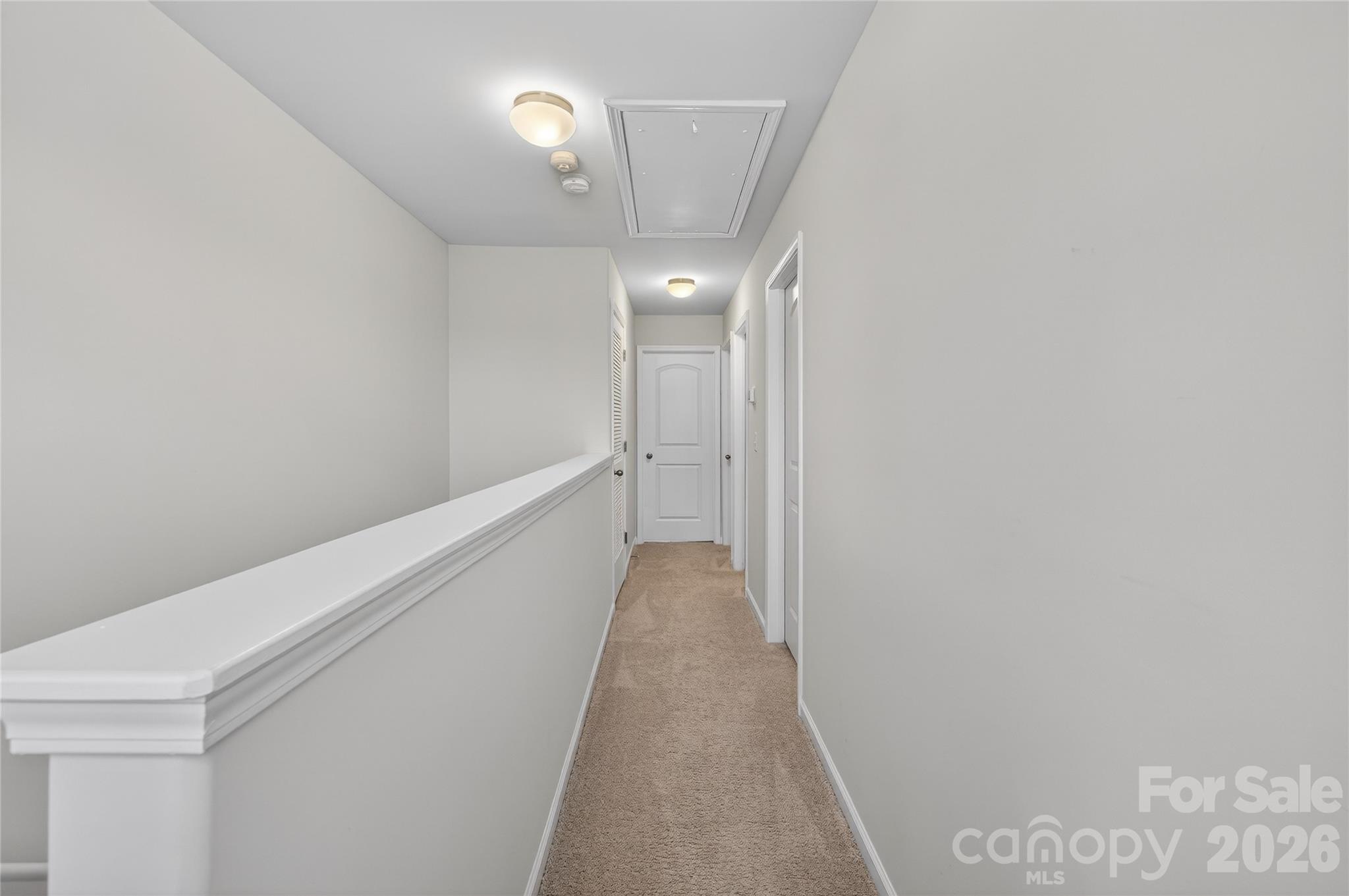 128 Pleasant Hill Street Lancaster, SC 29720 - Photo 20 of 26 a view of a hallway with wooden floor