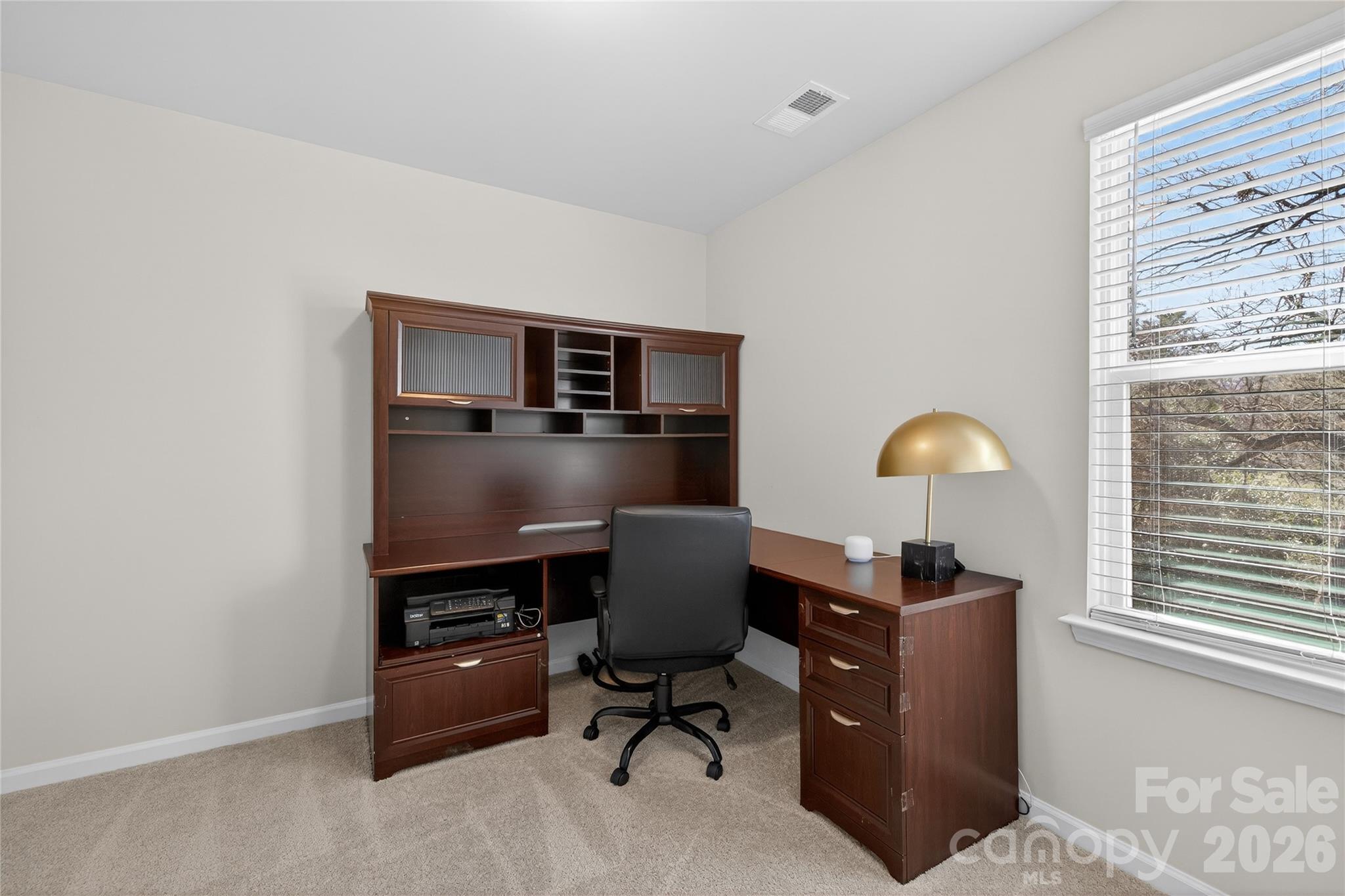 128 Pleasant Hill Street Lancaster, SC 29720 - Photo 24 of 26 a view of a workspace with furniture