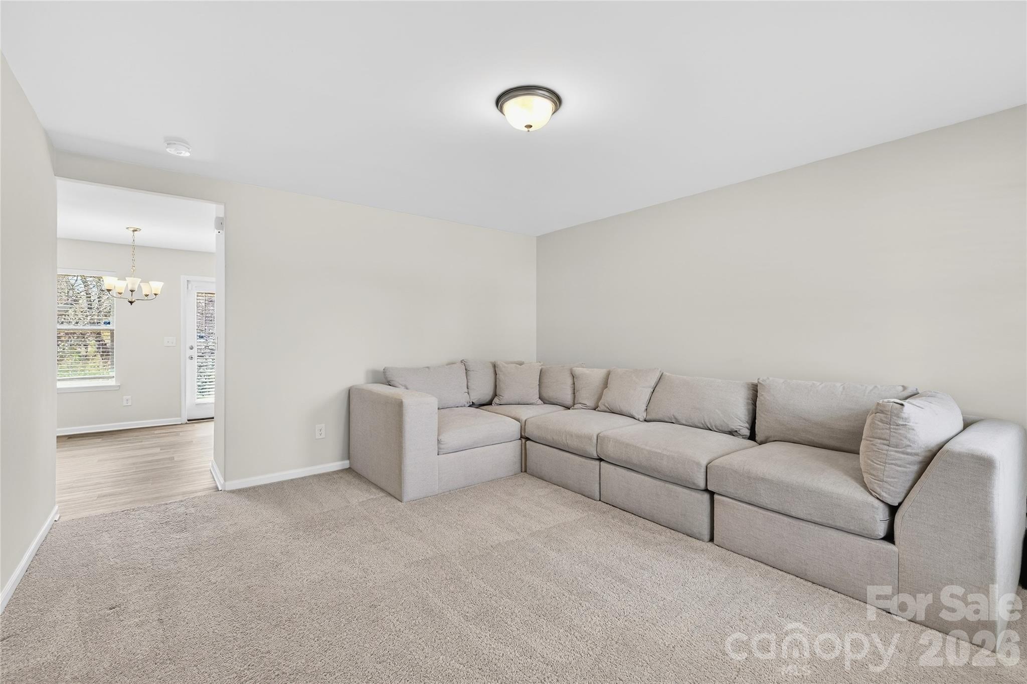 128 Pleasant Hill Street Lancaster, SC 29720 - Photo 10 of 26 a living room with furniture and a couch