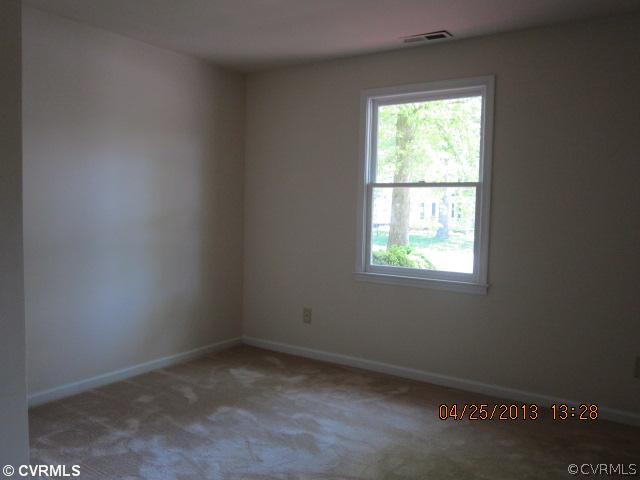 1512 Austin Road Chester, VA 23836 - Photo 14 of 14 an empty room with a window