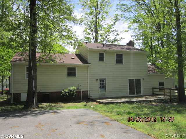 1512 Austin Road Chester, VA 23836 - Photo 2 of 14 a view of a house with a yard and large tree