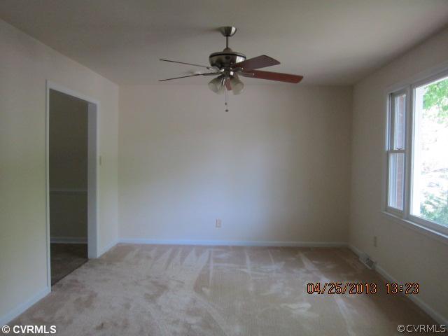 1512 Austin Road Chester, VA 23836 - Photo 3 of 14 an empty room with a window