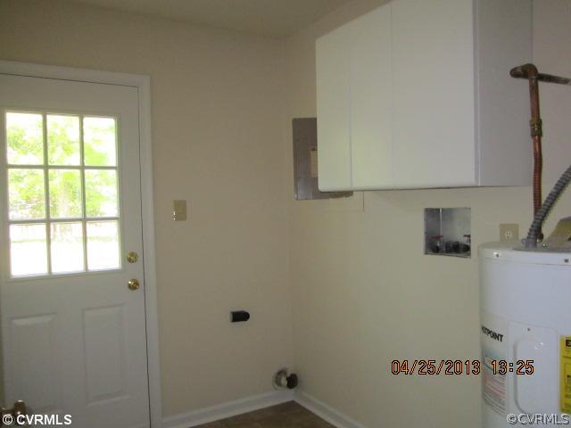 1512 Austin Road Chester, VA 23836 - Photo 6 of 14 a bathroom with a window and a shower