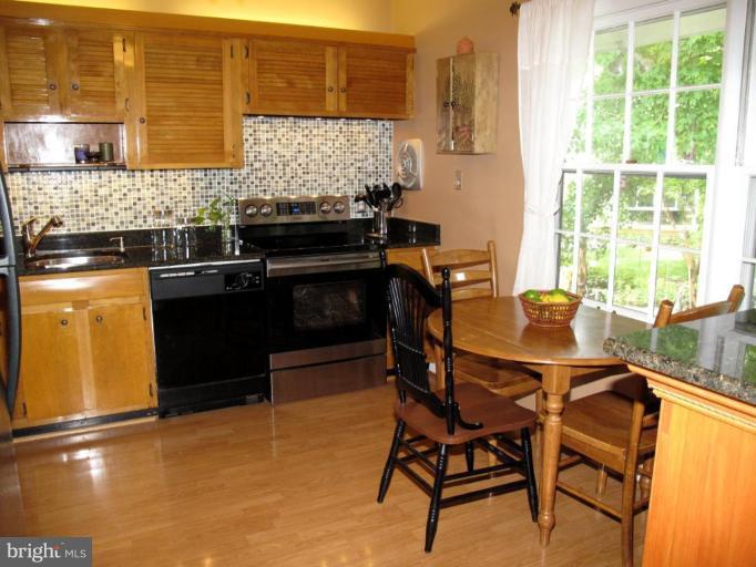8708 Bradgate Road Alexandria, VA 22308 - Photo 3 of 30 Hardwood floors and granite countertops