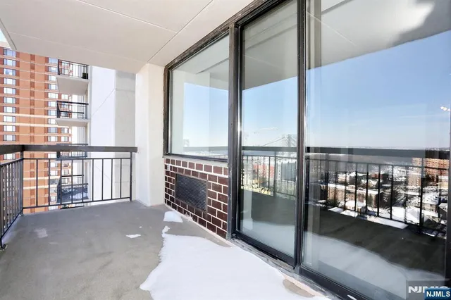 a view of a balcony with city view